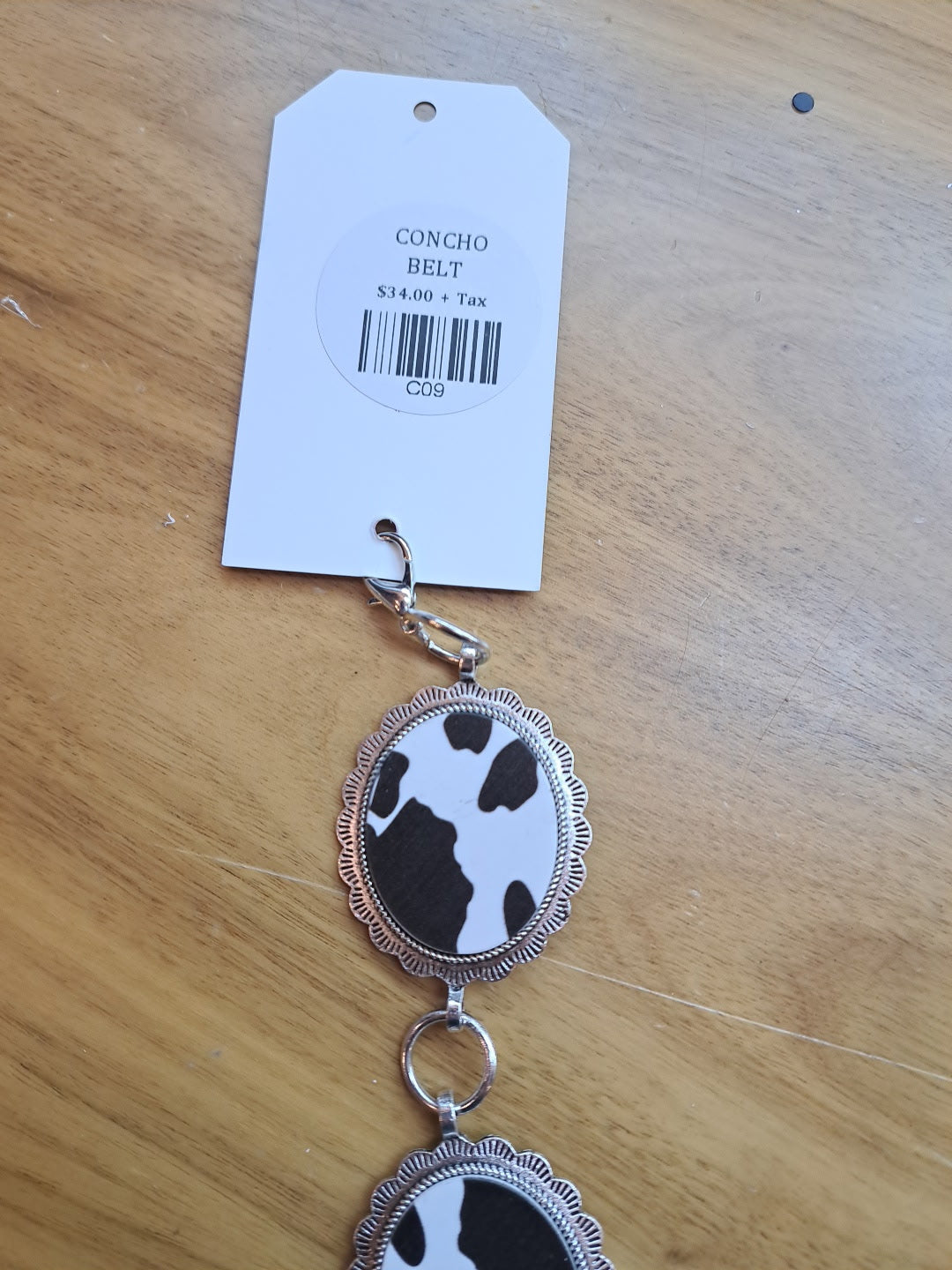 COW PRINT CONCHO BELT