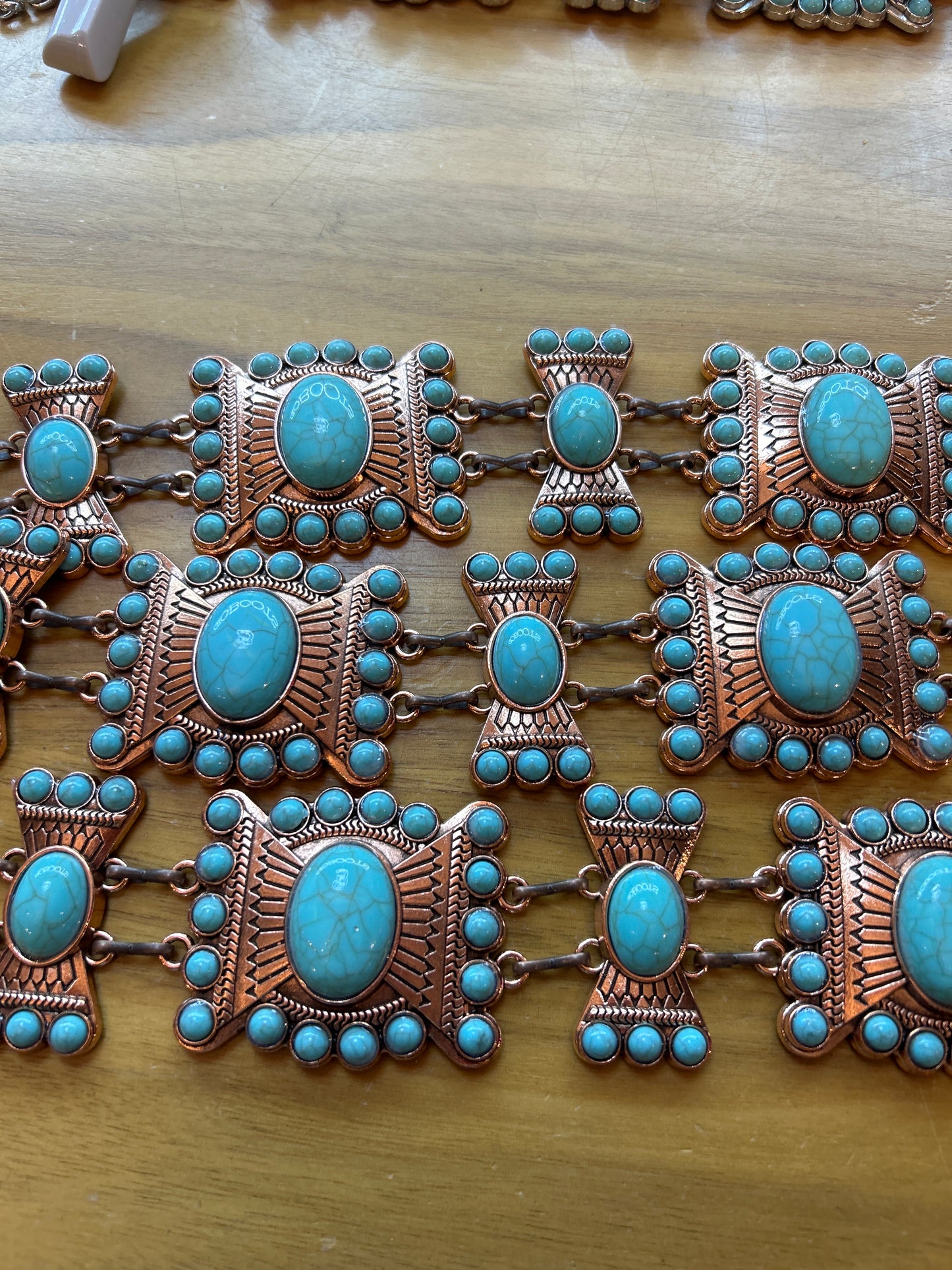 Blue/bronze Concho belts
