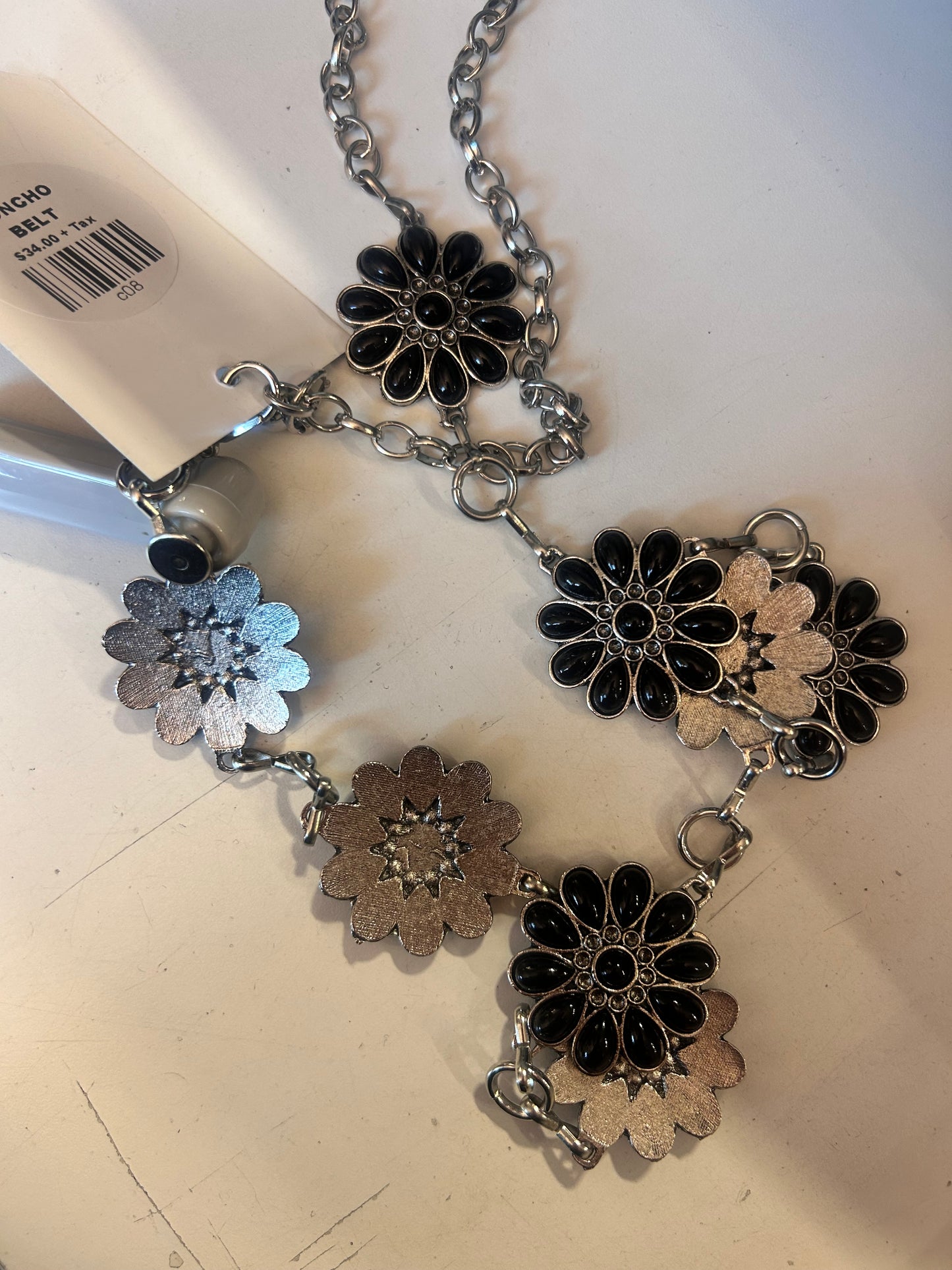 Concho belts black flowers